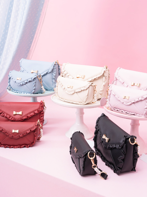 Bag With Heart Strap and Bow Ruffle