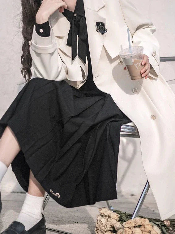 College Apricot Trench Coat + Metal Badge + Black Embroidery Ribbon Shirt + Pleated Skirt