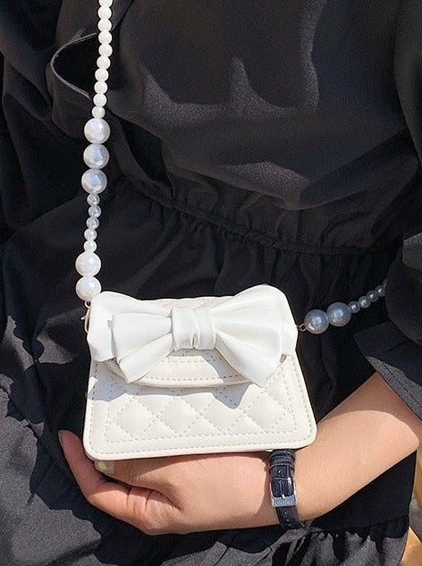Pearl Handle Quilted Bow Shoulder Bag
