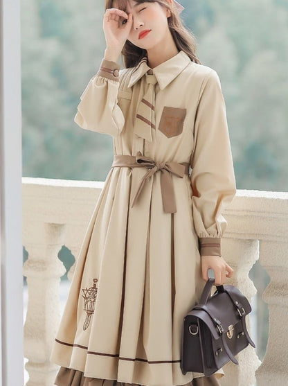 Cape Coat + Emblem Military Dress With Necktie