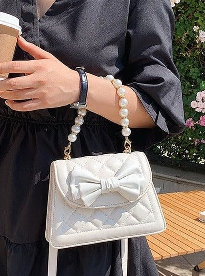 Pearl Handle Quilted Bow Shoulder Bag